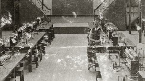 H.W. Hall in the classroom in the Corn Exchange Street building, c1920