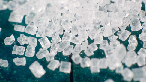 Magnification of grains of refined sucrose, the most common free sugar