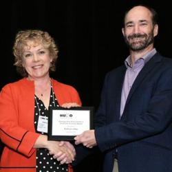 Kathryn Lilley being presented with the HUPO Award for Distinguished Achievement in Proteomic Sciences.