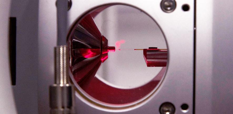 Gas-phase ions being generated in a nano-electrospray ion source. Gas-phase ions being generated in a nano-electrospray ion source.